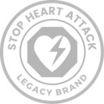 Legacy logo of StopHeartAttack.com: A circular emblem with 'Stop Heart Attack' around the perimeter, featuring an octagonal sign in the center enclosing a heart and an electric bolt, symbolizing cardiac emergency intervention and defibrillation.